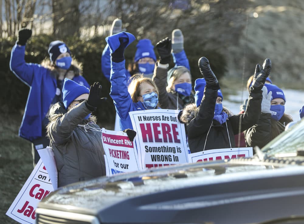 St. Vincent Hospital nurses are shown on strike in March 2021. Just weeks after the 10-month strike ended, a petition was filed to decertify the union that led nurses through the strike, Massachusetts Nurses Association. (Matthew J. Lee/The Boston Globe via Getty Images)
