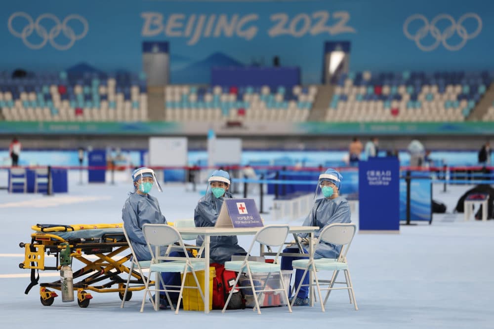 Medical staff in personal protective equipment look on during a training session at National Speed Skating Oval on Jan. 28, 2022 in Beijing, China. (Lintao Zhang/Getty Images)