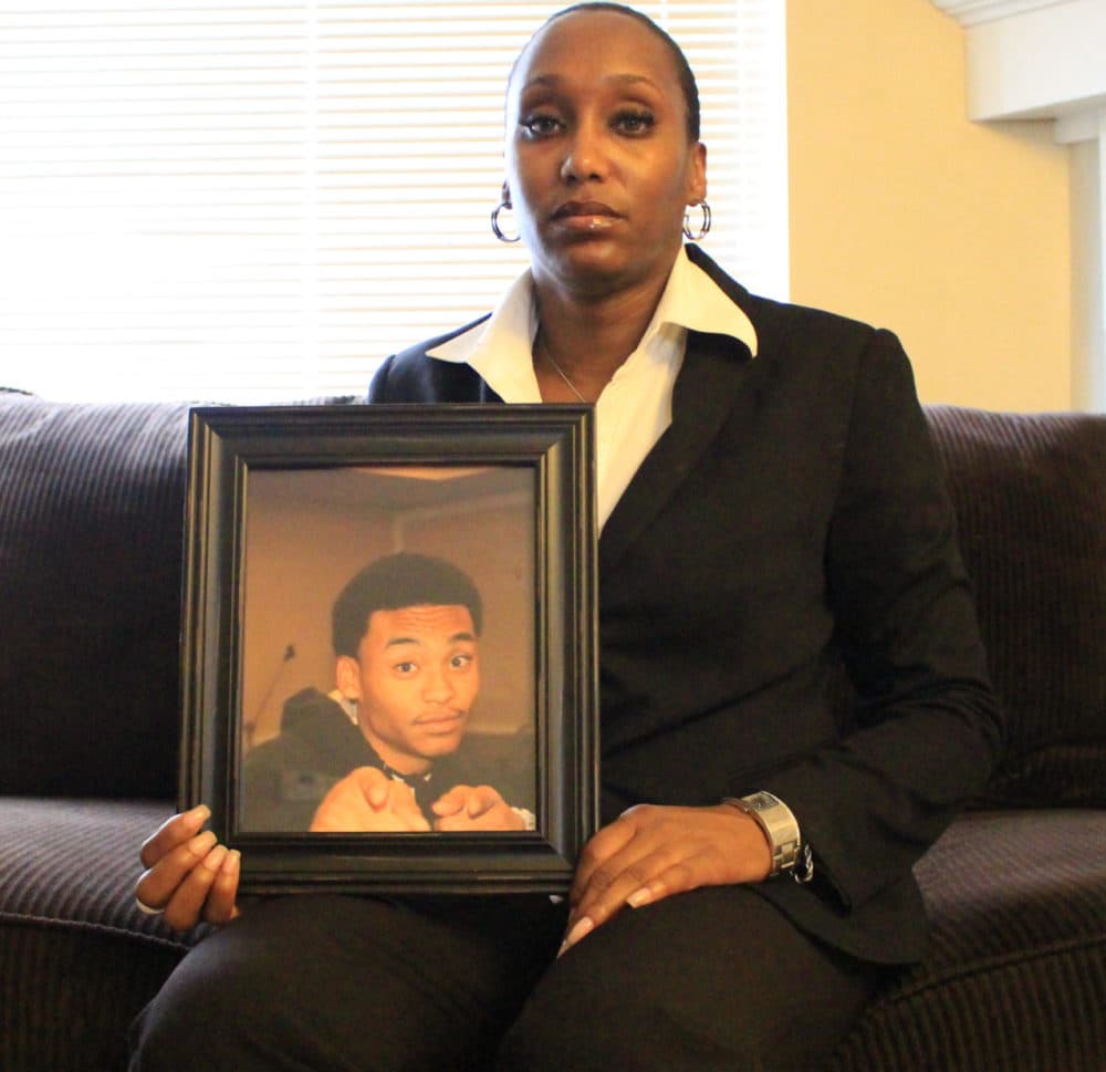 Shalisa Hayes holds a photo of her son, Billy Ray Shirley. (Courtesy Shalisa Hayes)