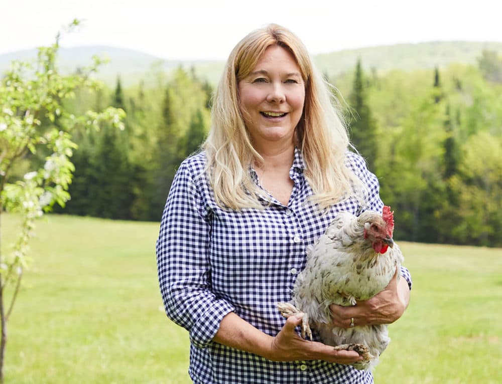 &quot;The Fresh Eggs Daily Cookbook&quot; author Lisa Steele with a chicken. (Tina Rupp)