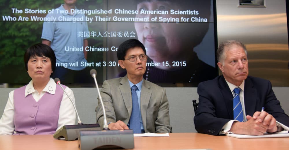 Chinese-American scientist Dr. Xiaoxing Xi, center, and Chinese-American hydrologist Sherry Chen, left, attend a press conference at Arent Fox in Washington D.C. on Sept. 15, 2015. (Xinhua/Bao Dandan via Getty Images)
