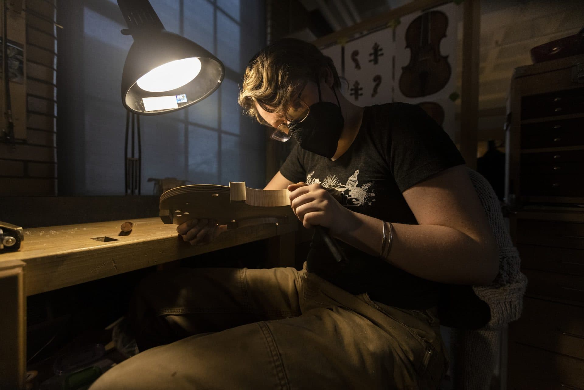 Ada Schenck works on building her 5th violin in the Violin Making and Repair program at North Bennet Street School. (Jesse Costa/WBUR)