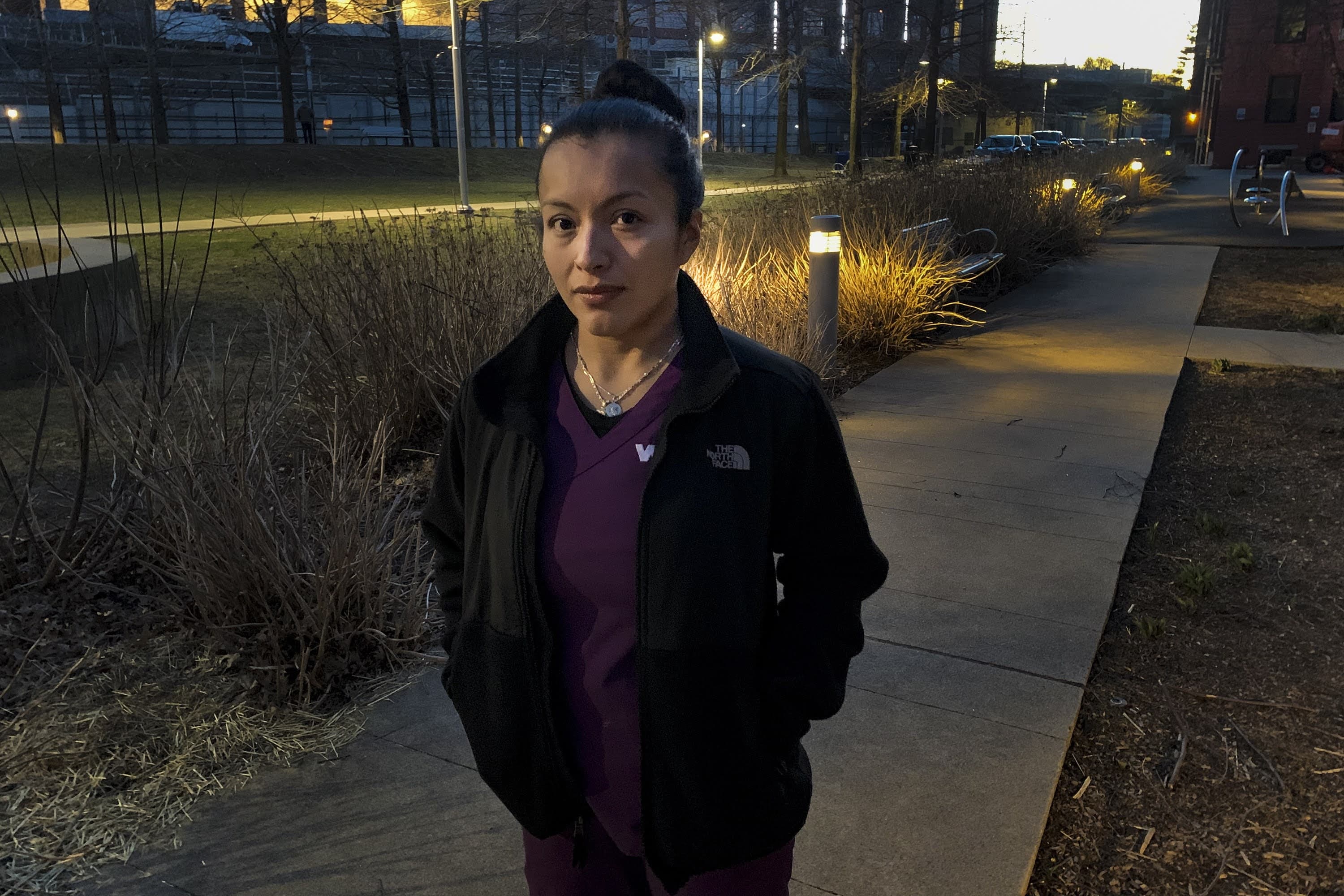 Vanessa Vela standing in Edward Leathers Community Park in Somerville. (Jesse Costa/WBUR)