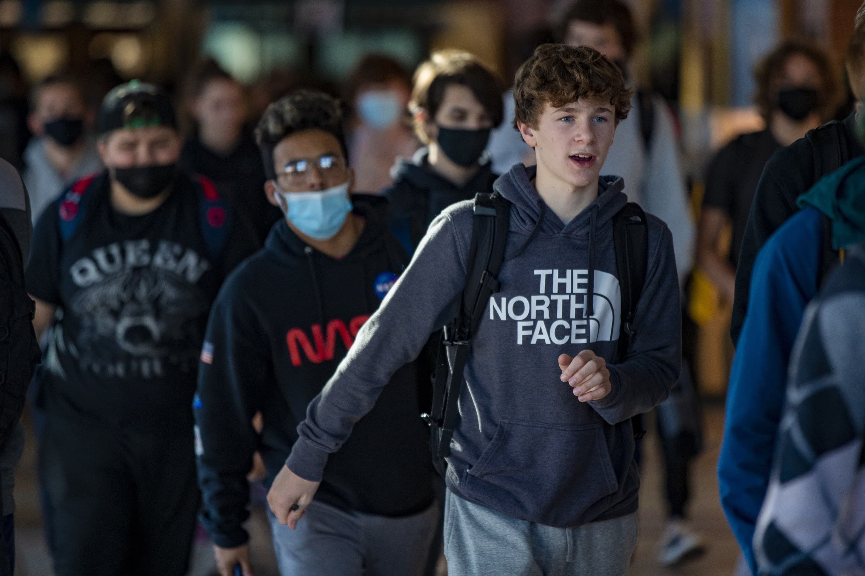 Students file out through the main corridor of Hopkinton High School during dismissal. (Jesse Costa/WBUR)