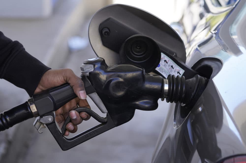A motorist pumps gasoline at a Mobil gas station following Russia's invasion of Ukraine, in West Hollywood, Calif., on Feb. 25, 2022. (Damian Dovarganes/AP)