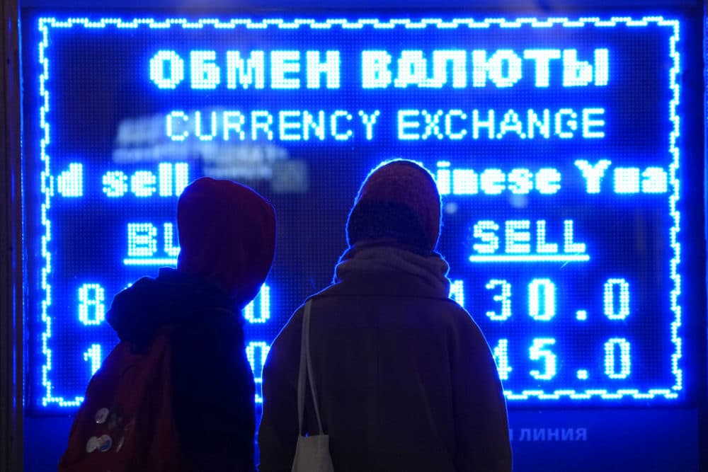 A screen displays exchange rate at a currency exchange office in St. Petersburg, Russia. (Dmitri Lovetsky, File/AP Photo)
