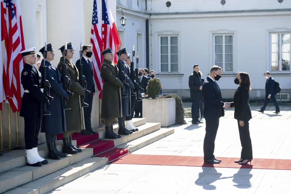 Poland's President Andrzej Duda, second right, greets Vice President Kamala Harris as she arrives for meetings at Belwelder Palace, in Warsaw, March 10, 2022. (Saul Loeb/Pool Photo via AP)