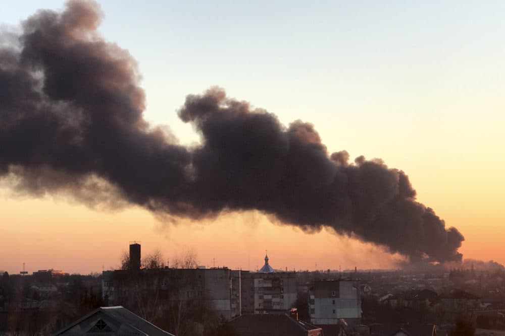 A cloud of smoke raises after an explosion in Lviv, western Ukraine, on March 18, 2022. The mayor of Lviv says missiles struck near the city's airport early Friday. (AP Photo)