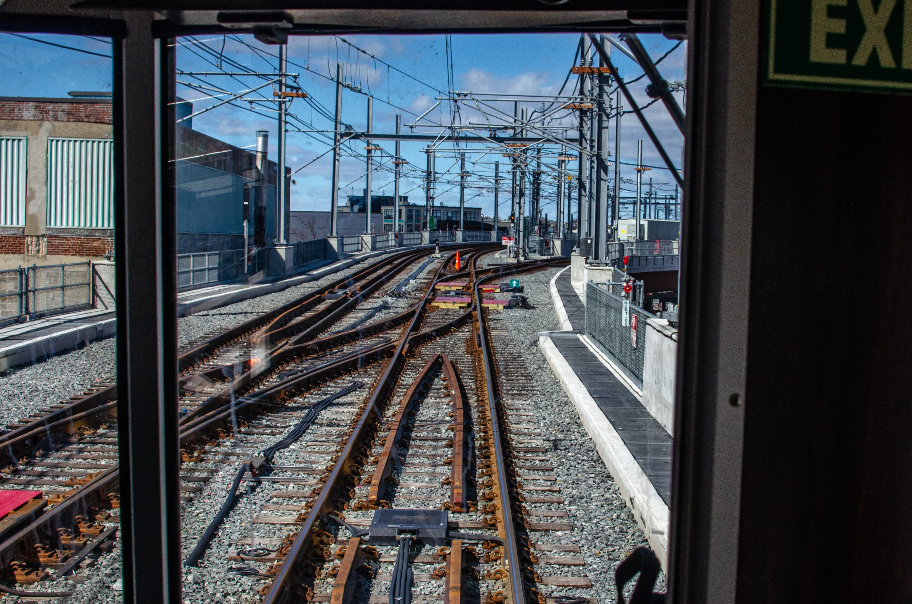 View through the front window of the MBTA trolley on the Green Line Extension during a test ride from Lechmere to Union Square. (Sharon Brody/WBUR)