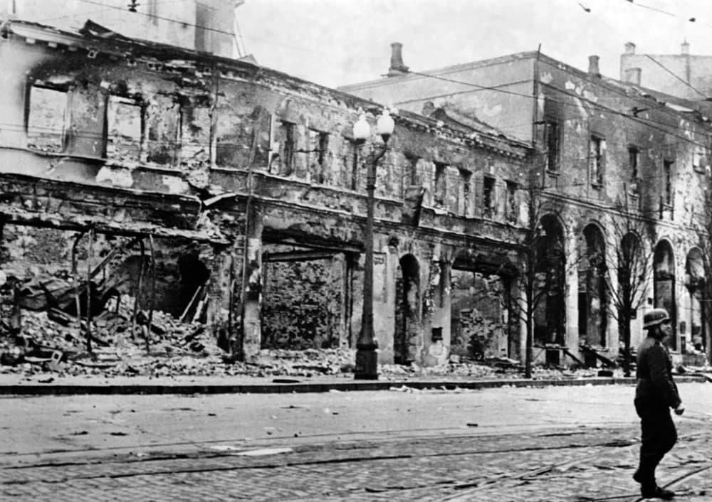 The Nazi propaganda picture shows a soldier of the German Wehrmacht standing in front of destroyed buildings in Kharkiv, Ukraine in November 1941. (Berliner Verlag/Archiv/picture alliance via Getty Images)