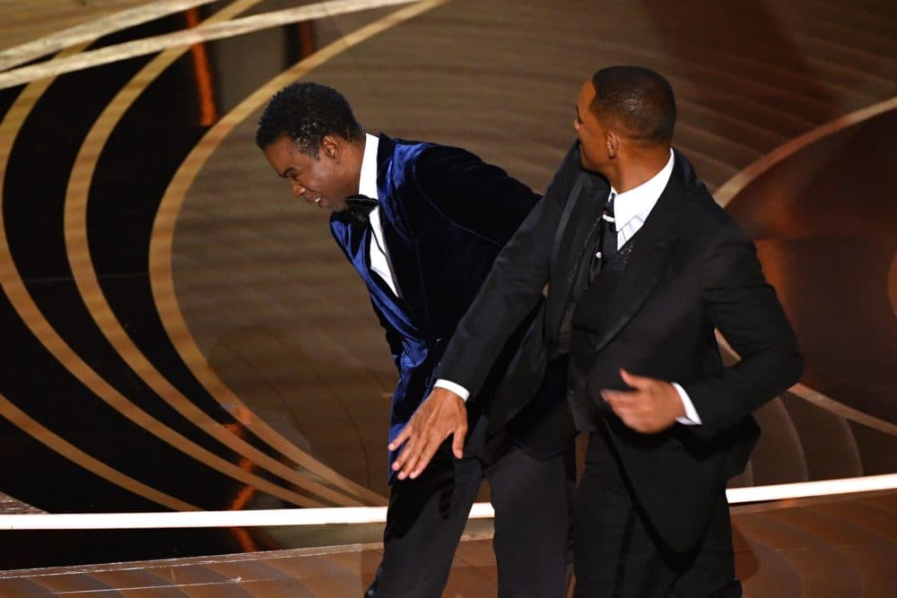 Will Smith slaps Chris Rock onstage during the 94th Oscars at the Dolby Theatre in Hollywood, California on March 27, 2022. (Robyn Beck/AFP via Getty Images)