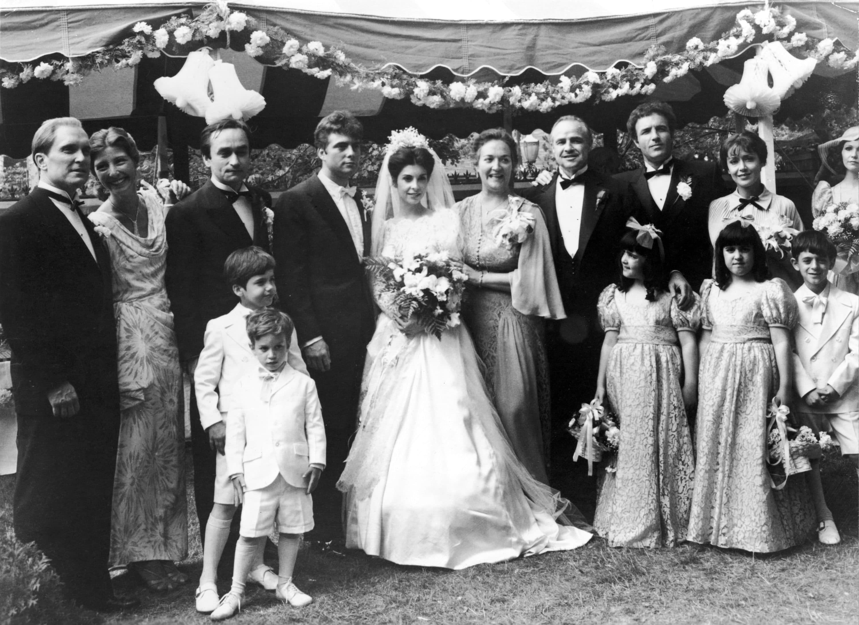 The cast of the film "The Godfather" pose for a family portrait during the wedding scene in a still from the film, directed by Francis Ford Coppola and based upon the novel by Mario Puzo. Left to right: Robert Duvall, Tere Livrano, John Cazale, Gianni Russo, Talia Shire, Morgana King, Marlon Brando and James Caan. (Paramount Pictures/Getty Images)