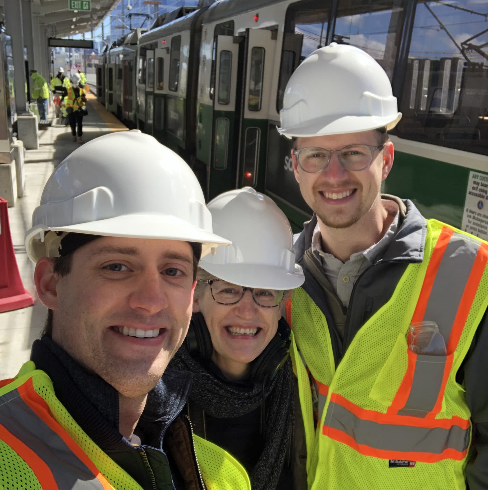 Sharon Brody and her sons Jack and Campbell during their excursion along the MBTA Green Line Extension, at the new Union Square Station in Somerville. (Sharon Brody/WBUR)