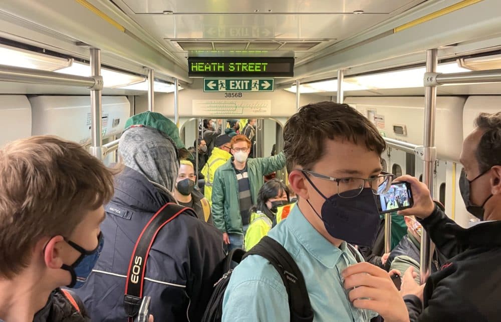 Passengers on the first trip of the completed Green Line extension. (Darryl C. Murphy/WBUR)