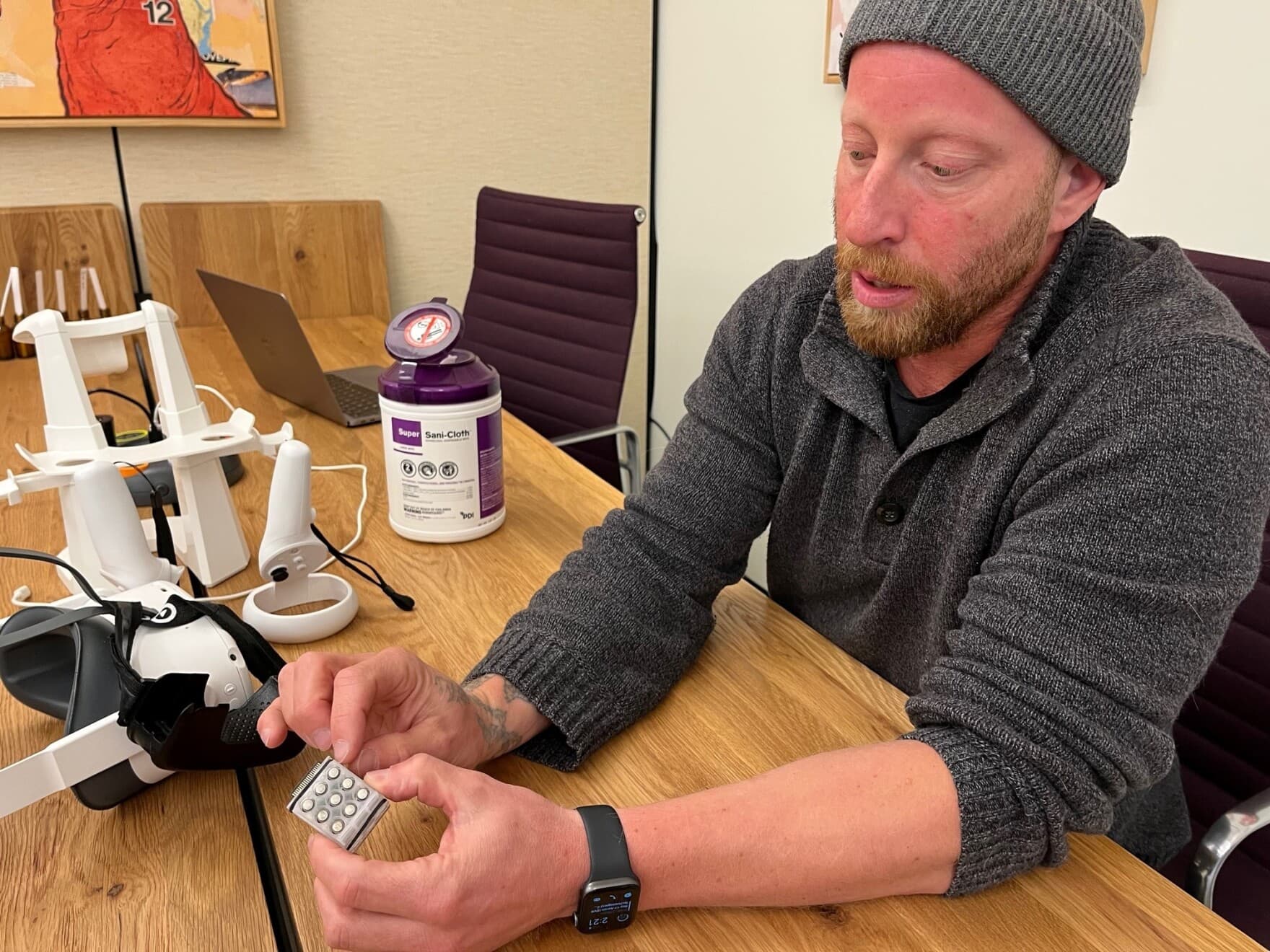 OVR Technology co-founder Andrew Wisniewski shows how his company's technology allows users to smell in virtual reality. (Mikaela Lefrak/VPR)