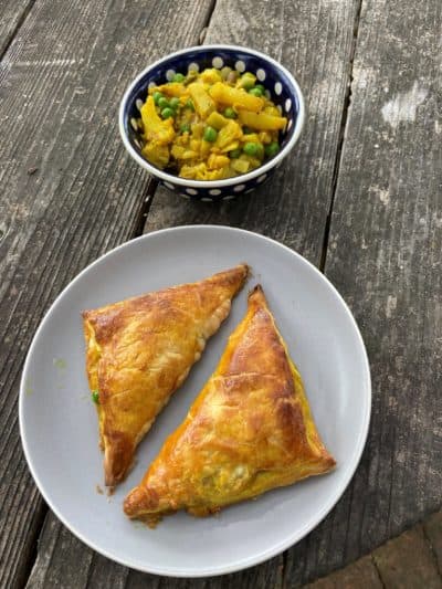 Indian-spiced cauliflower, potato and pea hand pies. (Kathy Gunst)