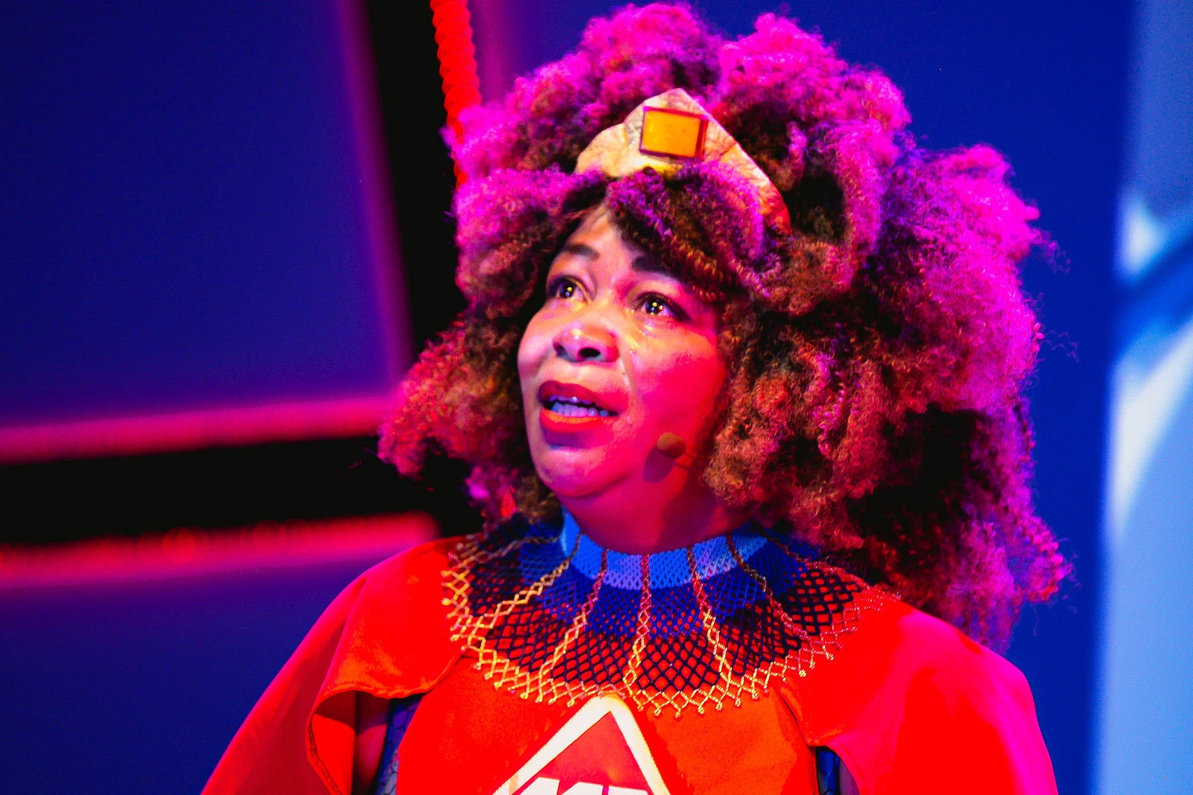 Ramona Lisa Alexander plays the title role in &quot;Black Super Hero Magic Mama&quot; at the Boston Public Library. (Courtesy Lauren Miller)