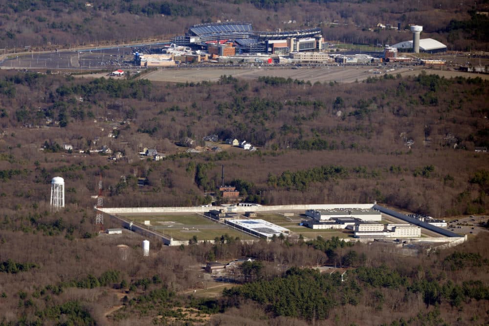 MCI-Cedar Junction at Walpole, with Gillette Stadium in the background, seen from the air in 2015. The prison, which opened in 1955, needs about $30 million in infrastructure repairs, according to the state's Department of Correction. (Christopher Evans/MediaNews Group/Boston Herald via Getty Images)