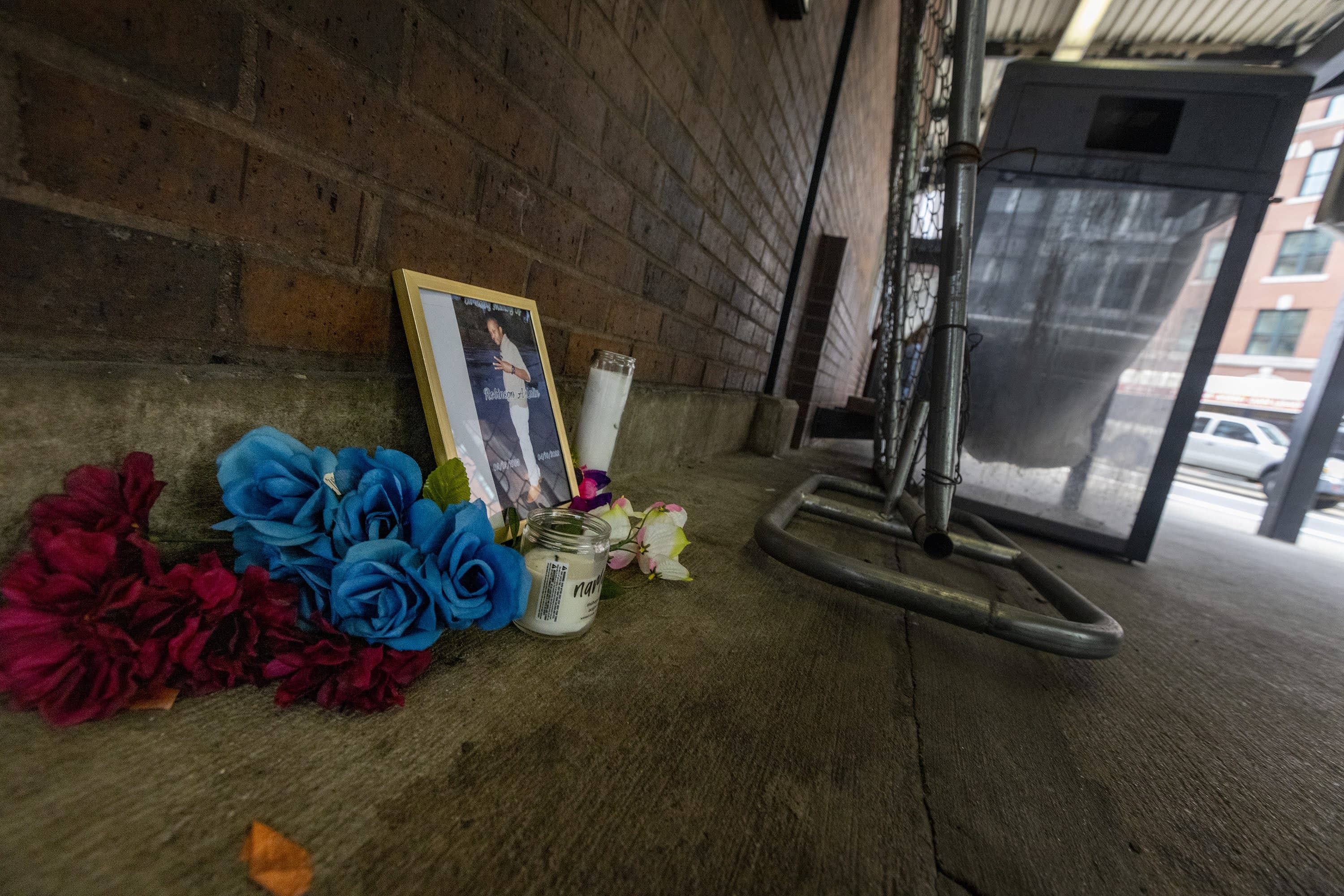 A small memorial for Robinson Lalin at the Broadway MBTA Red Line station. (Jesse Costa/WBUR)