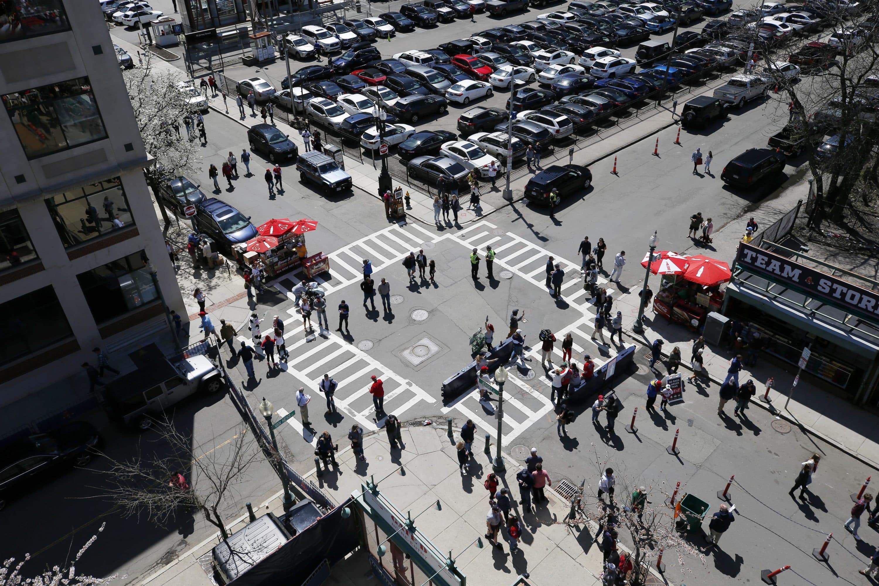 Fans outside Fenway Park before an Opening Day baseball game between the Boston Red Sox and the Minnesota Twins, Friday, April 15, 2022, in Boston. (AP Photo/Michael Dwyer)