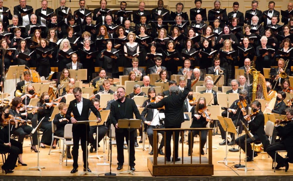 Soloists Ian Bostridge, Matthias Goerne, Amanda Majeski (rear), conductor Antonio Pappano, and the Tanglewood Festival Chorus performing in War Requiem. (Courtesy Hilary Scott/Boston Symphony Orchestra)