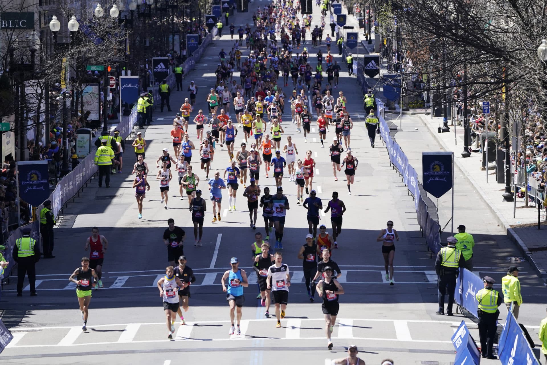 Runners approach the finish line of the 2022 Boston Marathon. (Charles Krupa/AP)
