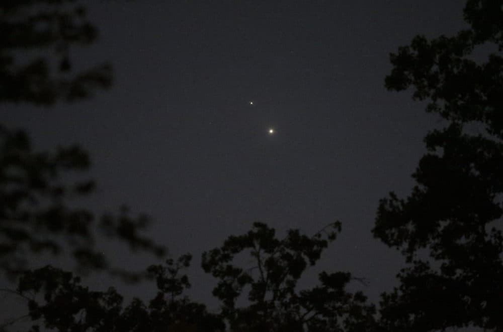 The planets Venus, bottom, and Jupiter, top, light the sky above Matthews, N.C., Monday, June 29, 2015. (Chuck Burton/AP)