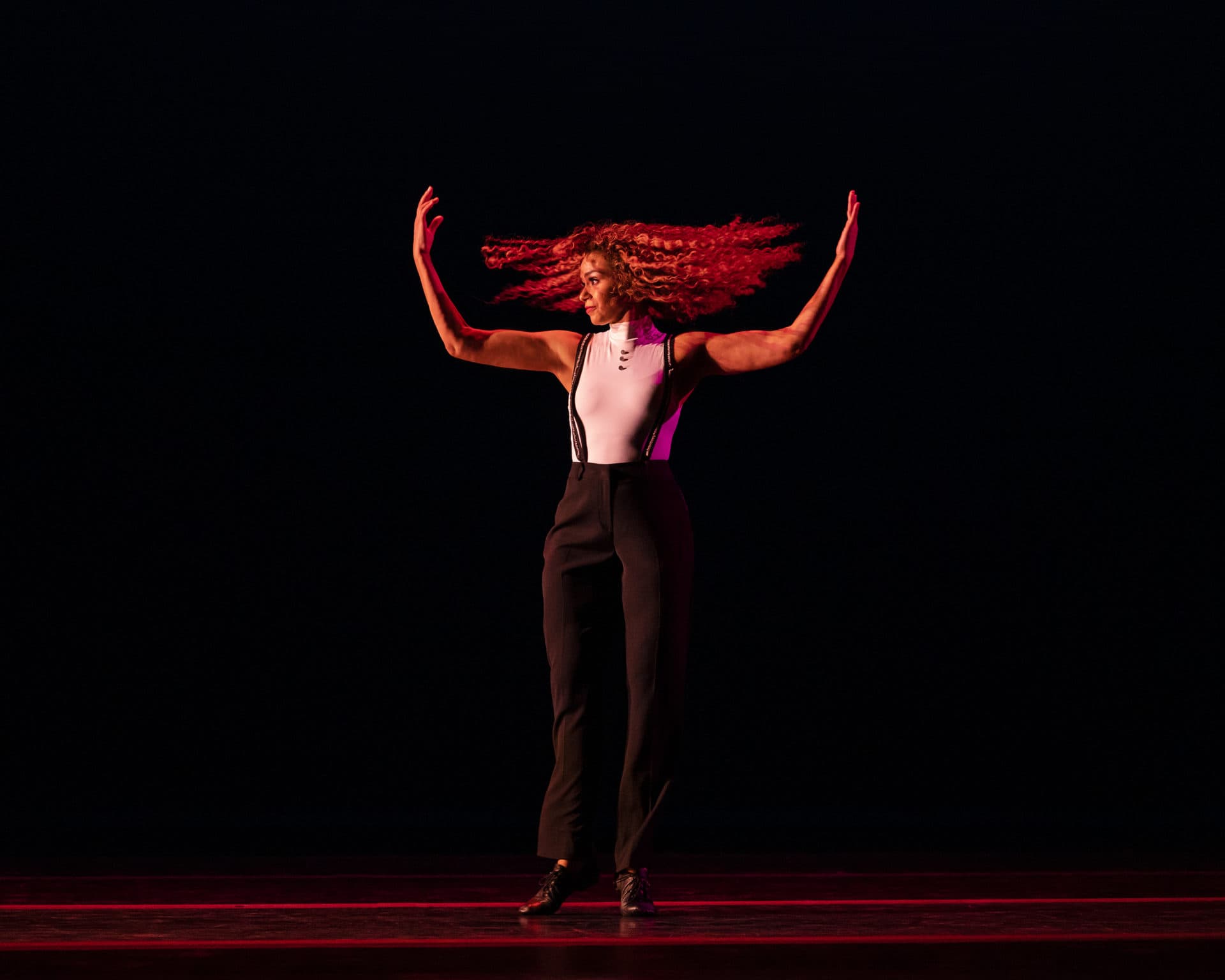Alvin Ailey American Dance Theater's Belén Indhira Pereyra in Robert Battle's For Four, stage premiere. (Courtesy Paul Kolnik)