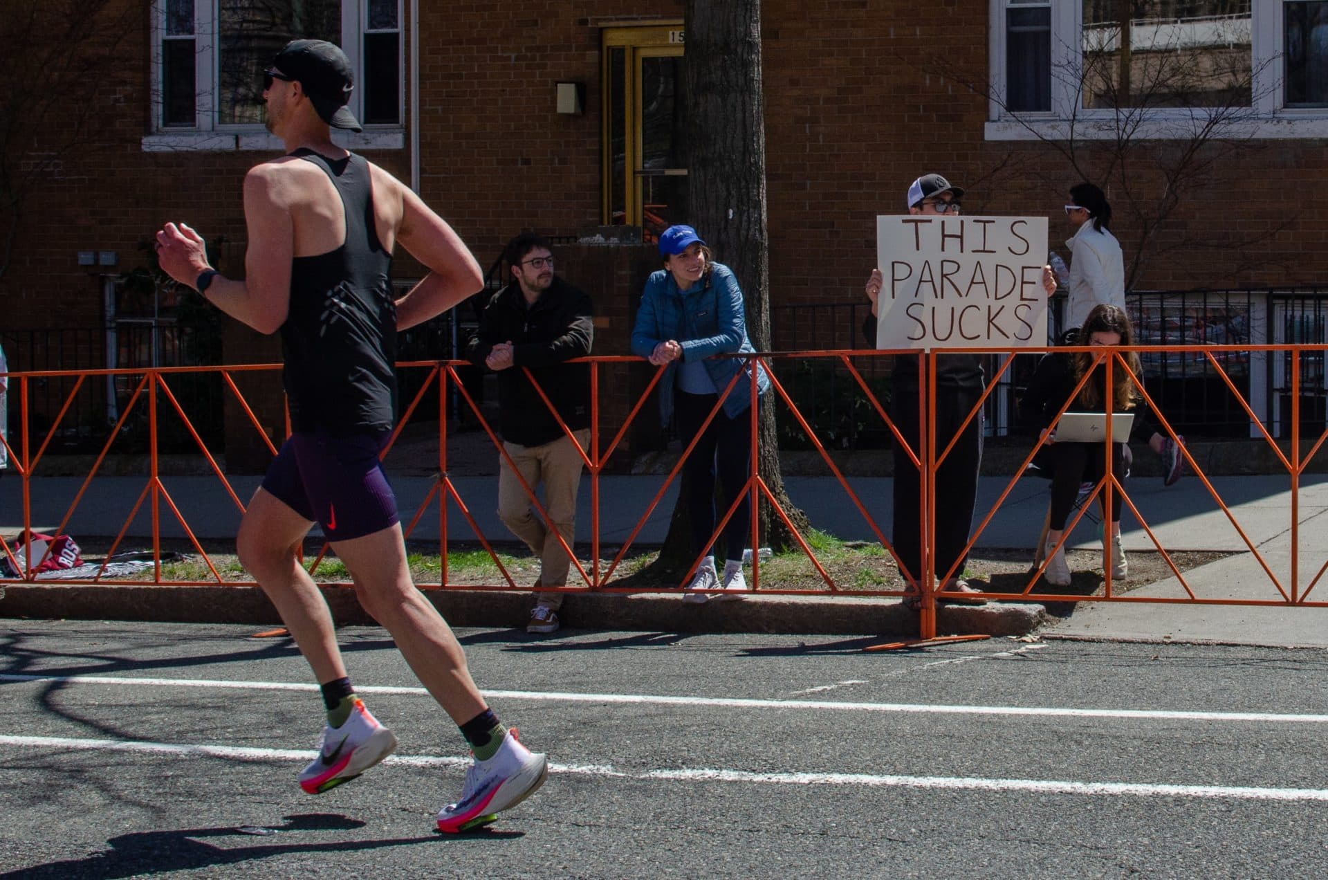 Everyone's a critic. A sign to amuse the marathoners, just outside Washington Square in Brookline. (Sharon Brody/WBUR)