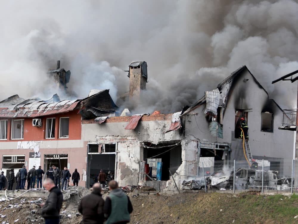 Firefighters battle a blaze after a civilian building was hit by a Russian missile on April 18, 2022 in Lviv, Ukraine. (Joe Raedle/Getty Images)