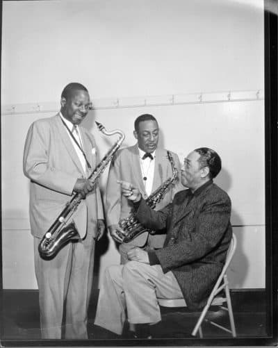 Duke Ellington, seated, Harry Carney and Johnny Hodges pose for a portrait on June 20, 1960. (Photo by Michael Ochs Archives/Getty Images)