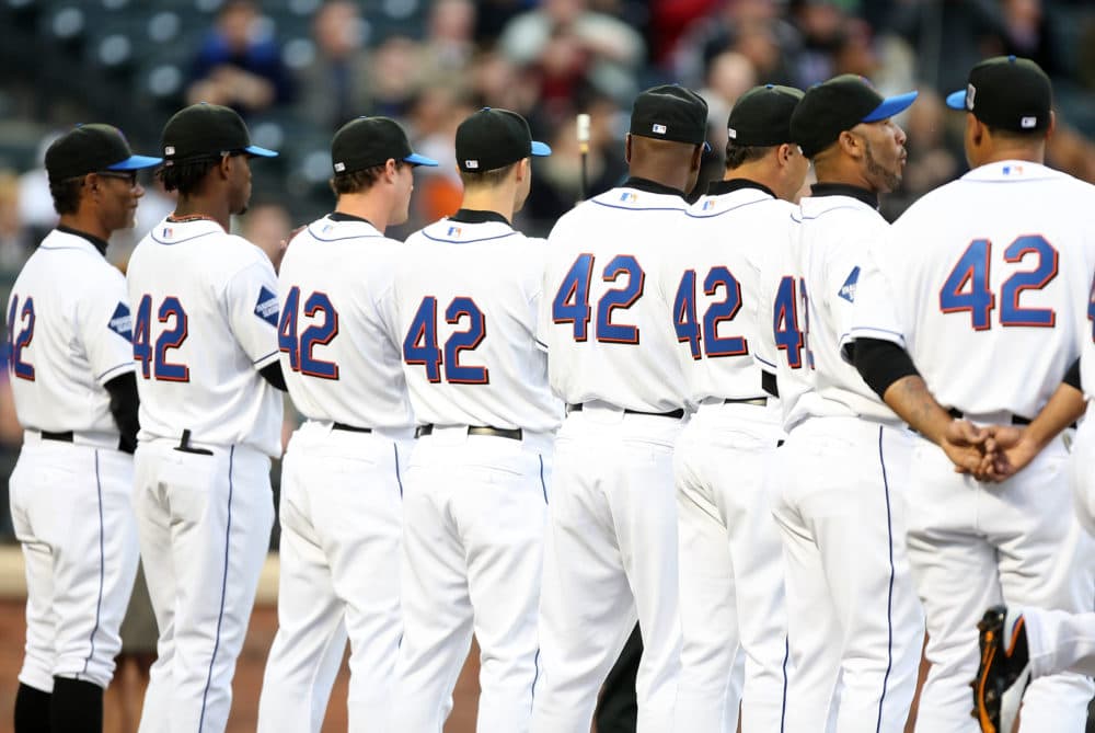 Players on the New York Mets all wear the #42 in honor of Jackie Robinson Day before their game against the San Diego Padres on April 15, 2009 at Citi Field in the Flushing neighborhood of the Queens borough of New York City. All Major League Baseball players are wearing #42 in honor of Jackie Robinson day. (Ezra Shaw/Getty Images)