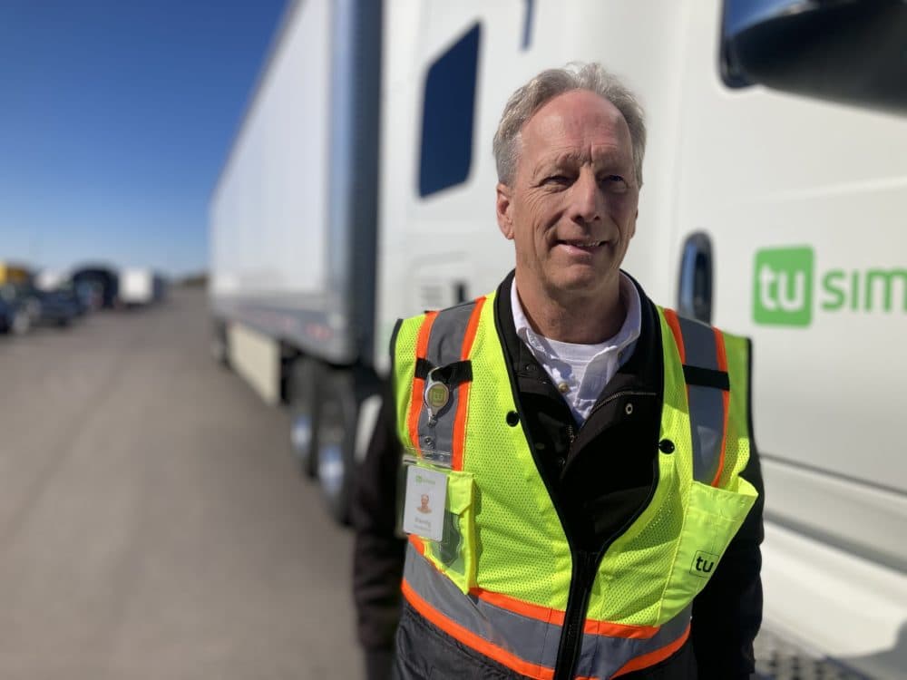 Randy Redwine has been a trucker for decades. When the TuSimple trucks are doing autonomous runs on the interstate, Redwine sits in the driver’s seat to take over the controls in case emergency. (Peter O'Dowd/Here &amp; Now)