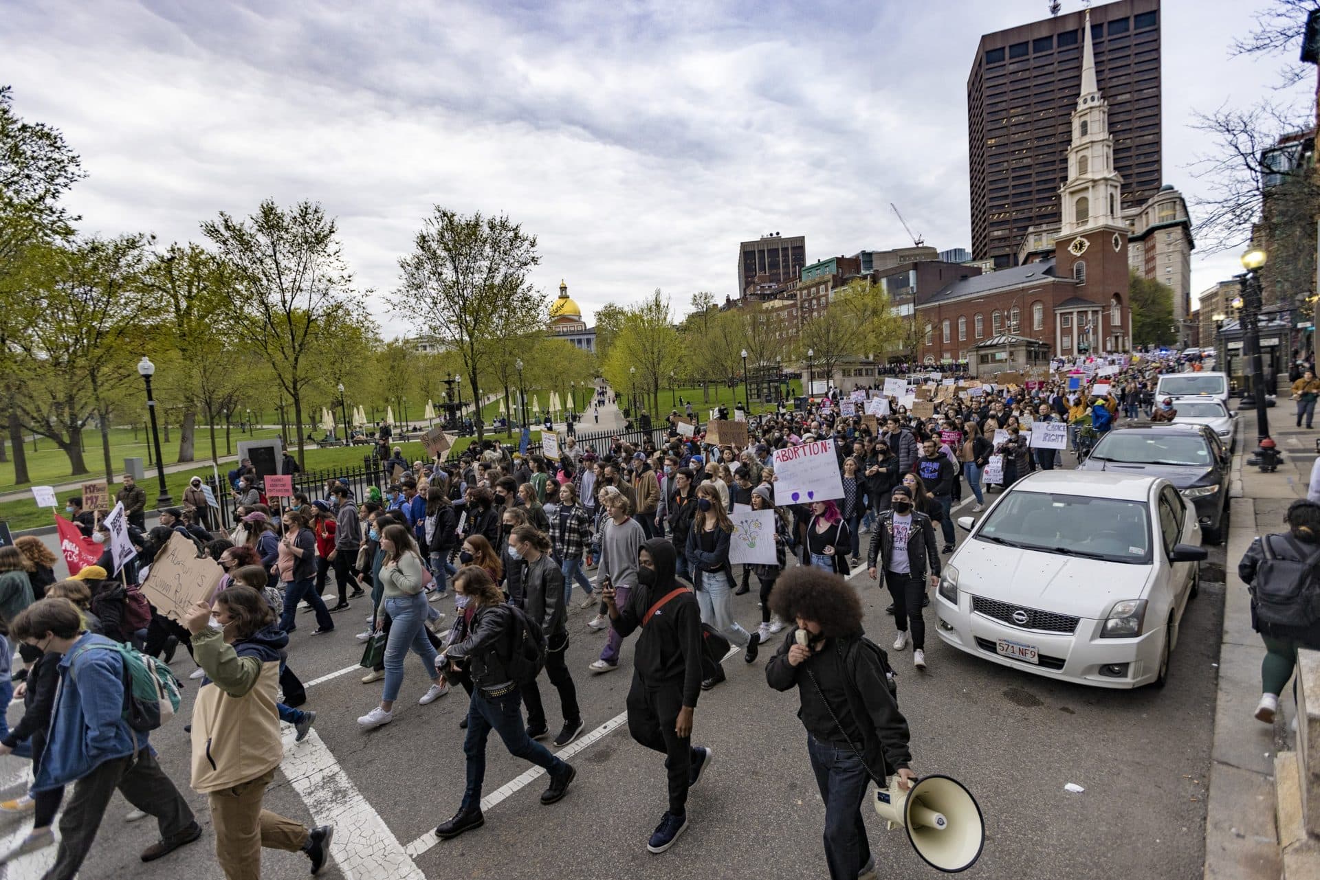 Thousands of protesters make their way down Tremont Street during the Defend Abortion Rights rally at the Massachusetts State House. (Jesse Costa/WBUR)