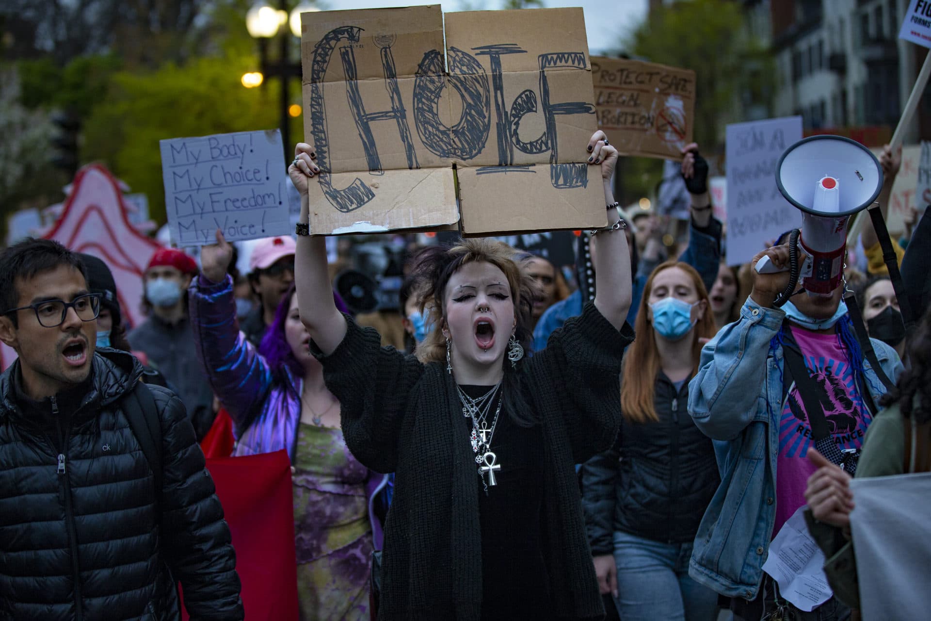 Thousands of protesters march down Beacon Street during the Defend Abortion Rights rally at the Massachusetts State House. (Jesse Costa/WBUR)