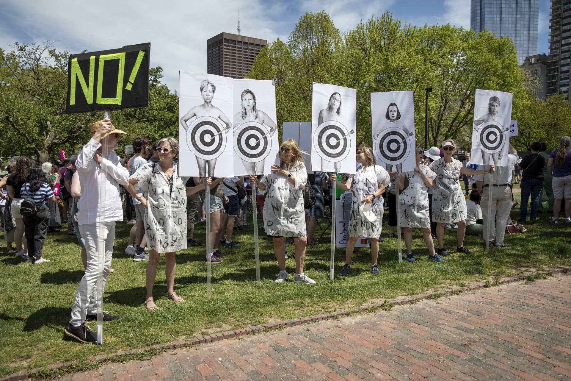 Protester and artist Mary Flannery and a group of friends brought self portraits to the Bans Off Our Bodies rally on Boston Common. (Robin Lubbock/WBUR)