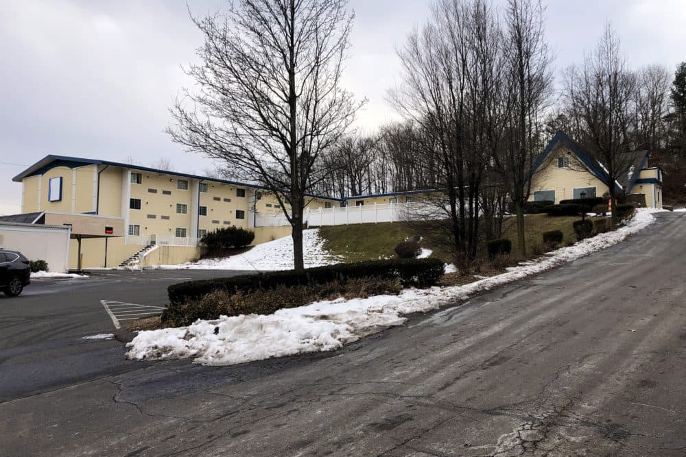 A former Motel 6 in Holyoke being used as a shelter for adults experiencing homelessness. (Lynn Jolicoeur/WBUR)