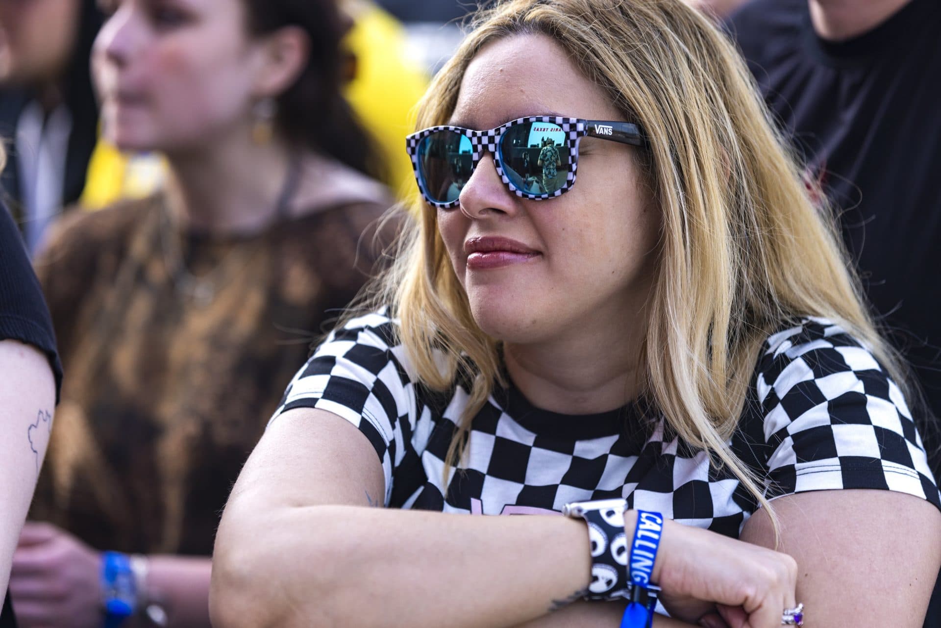 A festival goer in the front row watches Paris, Texas. (Jesse costa/WBUR)