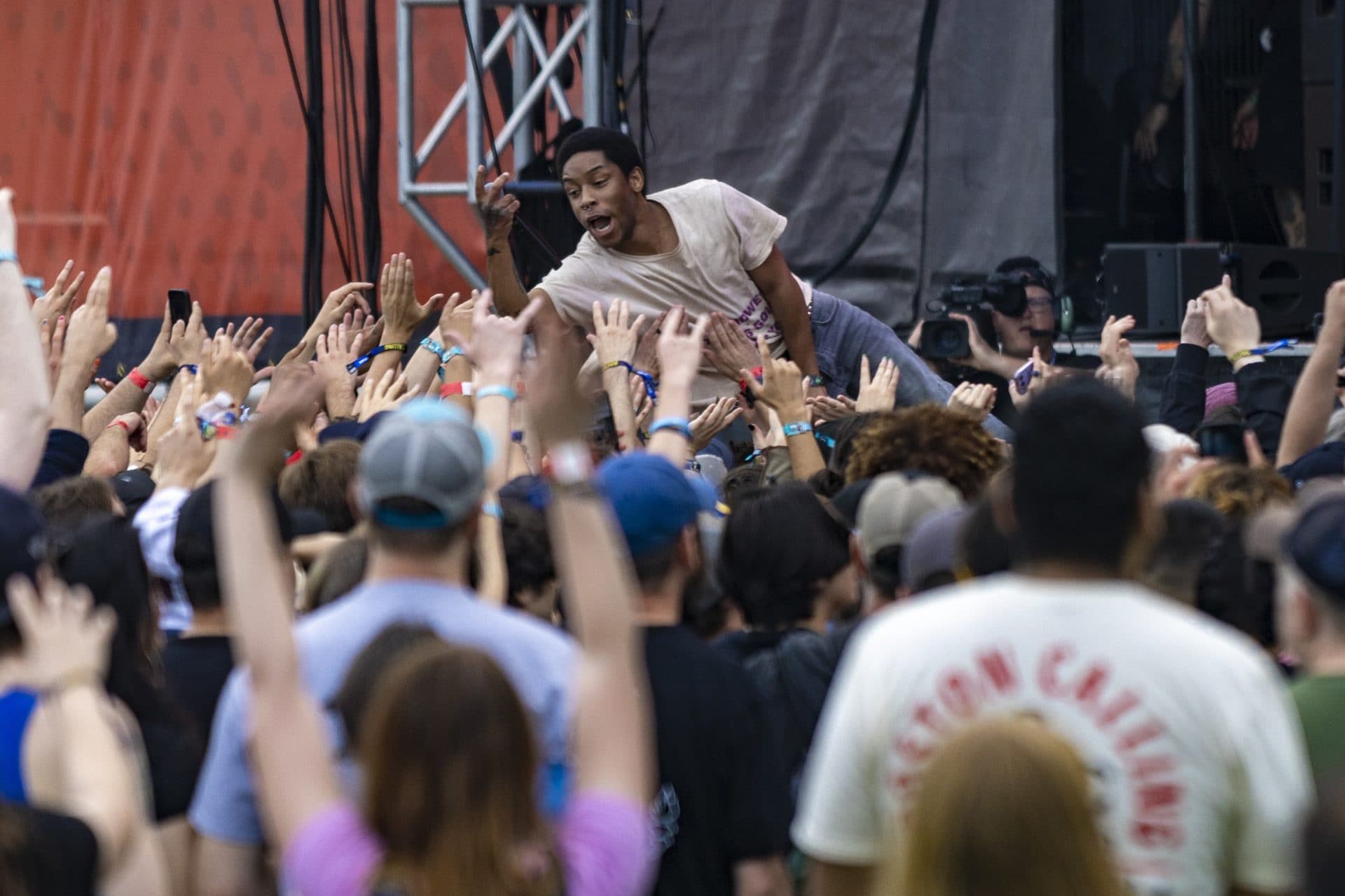 KennyHoopla dives into the crowd during his set at the Boston Calling Music Festival. (Jesse Costa/WBUR)