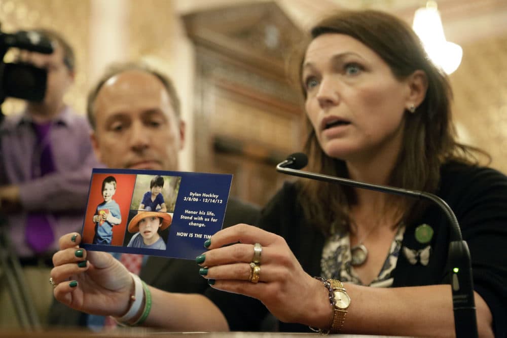 Nicole Hockley, a parent who lost her child, Dylan Hockley, 6, in the Sandy Hook school shooting in Connecticut, testifies on assault weapon legislation during a Senate Executive Committee hearing at the Illinois State Capitol Monday, May 20, 2013, in Springfield Ill. (Seth Perlman/AP)
