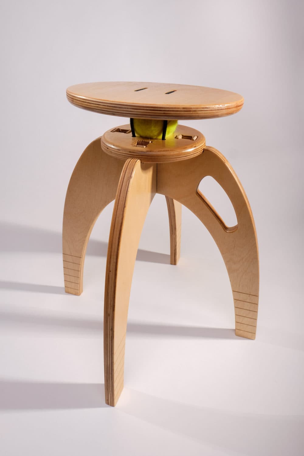 A ButtOn Chair for kids made with a tennis ball. Users found that tennis balls collapsed over time, so lacrosse balls were substituted. (Courtesy of QOR360)