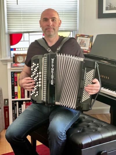 Composer Eric Shimelonis playing the accordion, an instrument thought to originate in Germany, though you can hear its music in many places, including Mexico, Brazil, Columbia, Europe, the US, and Canada. (courtesy of Rebecca Sheir)