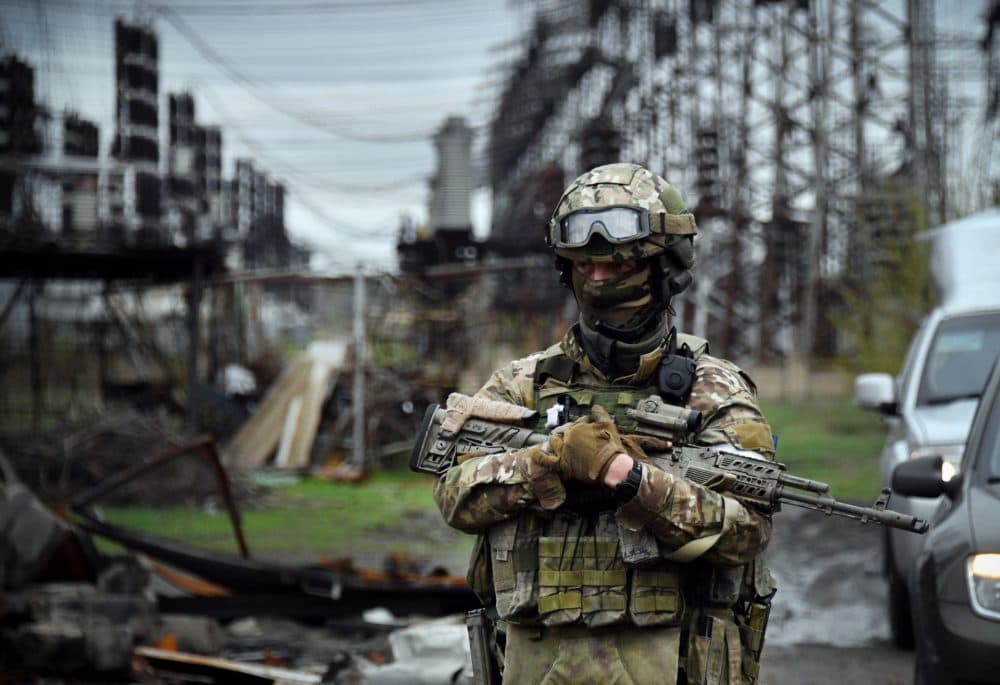 On April 13, 2022, a Russian soldier stands guard at the Luhansk power plant in the town of Shchastya. (Alexander Nemenov/AFP via Getty Images)