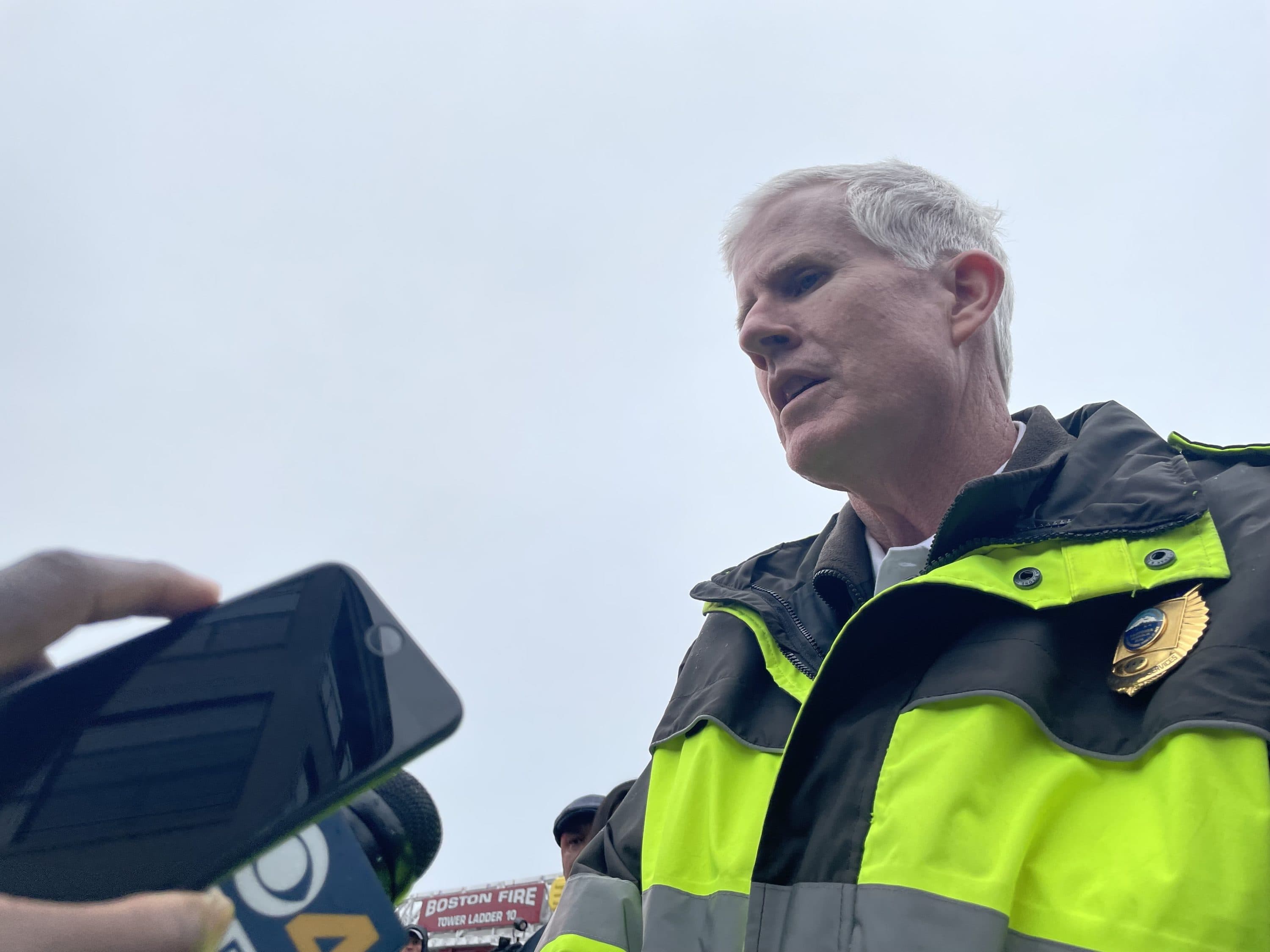 Boston Emergency Medical Services Deputy Superintendent Steven McHugh speaks to the media following a partial building collapse at the former Boston Edison plant in South Boston. (Darryl Murphy/WBUR)