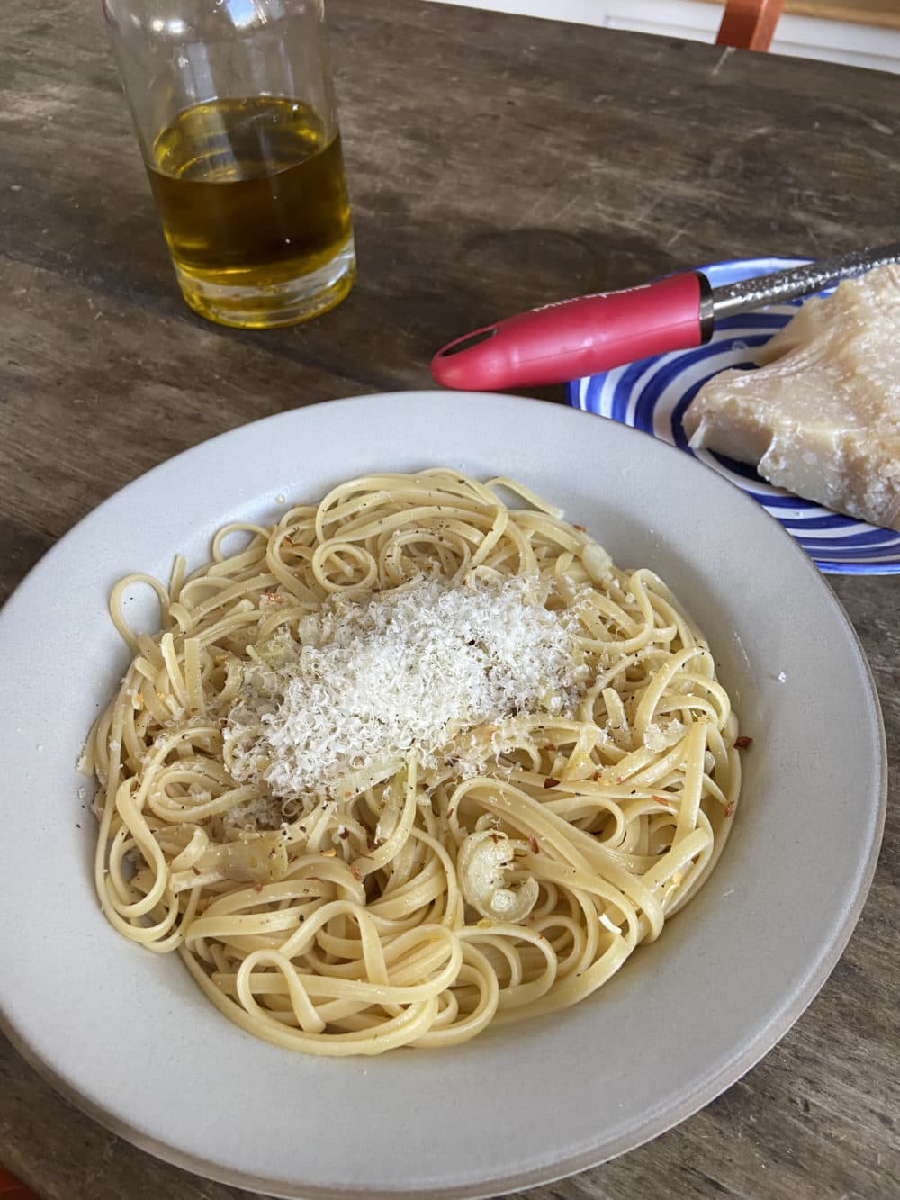 Aglio e olio (garlic and oil) linguine with parmesan cheese. (Kathy Gunst/Here &amp; Now)