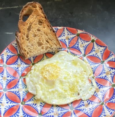 Olive oil fried egg. (Kathy Gunst/Here &amp; Now)