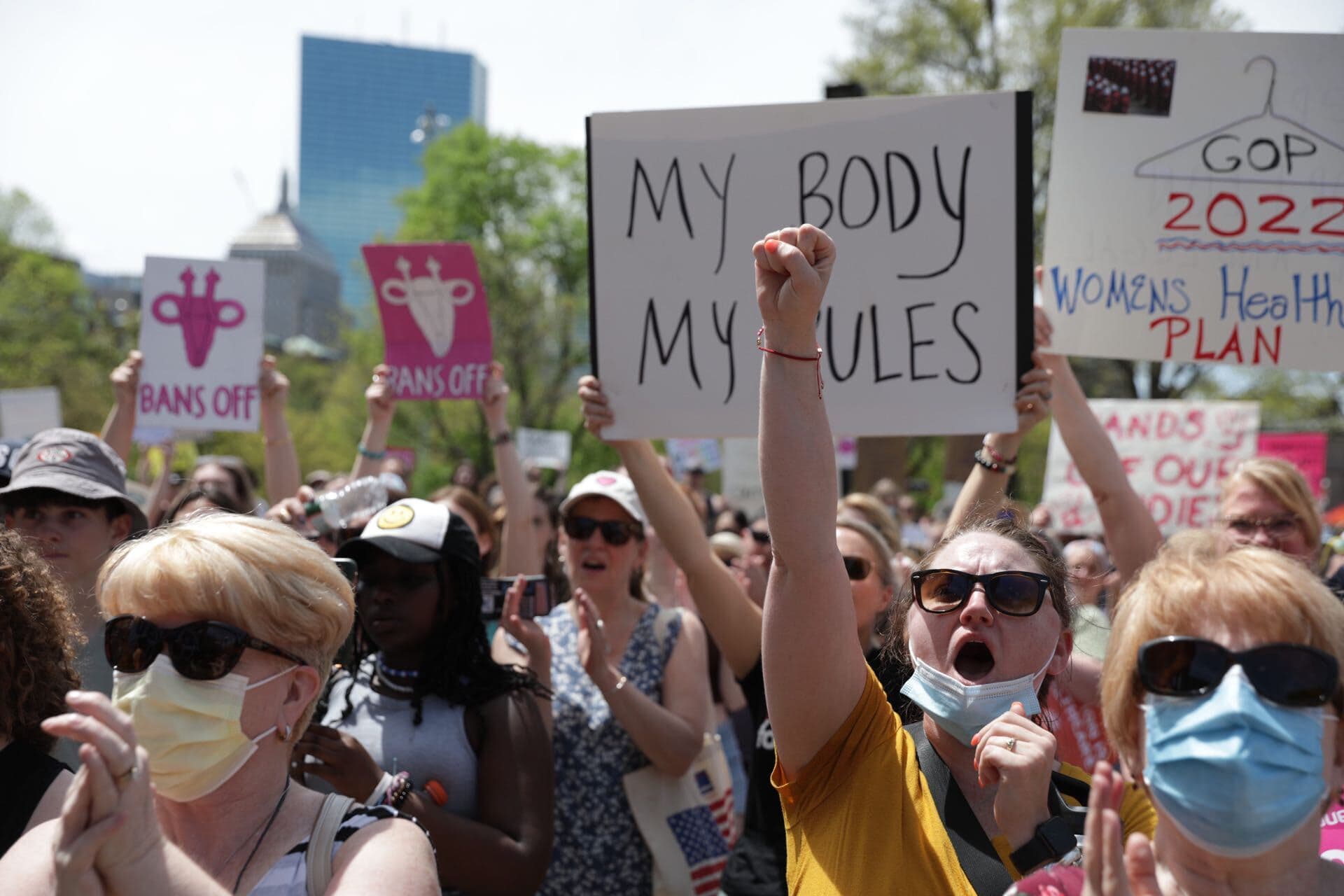 Protestors flocked to the Boston Common with signs in hand Saturday afternoon to support abortion rights and decry the recent draft opinion from the Supreme Court in favor of overturning Roe v. Wade. (Robin Lubbock/WBUR)