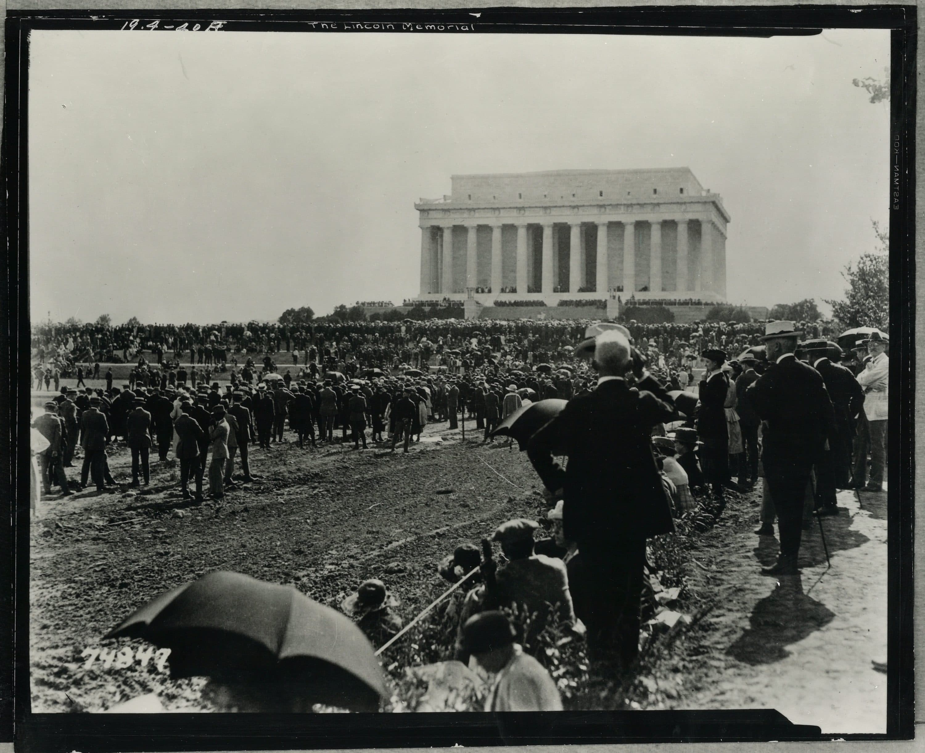A black and white photo of the crowd gathered on the Lincoln Memorial dedication on May 30, 1922. The memorial is in the distance. Courtesy of the National Archives.