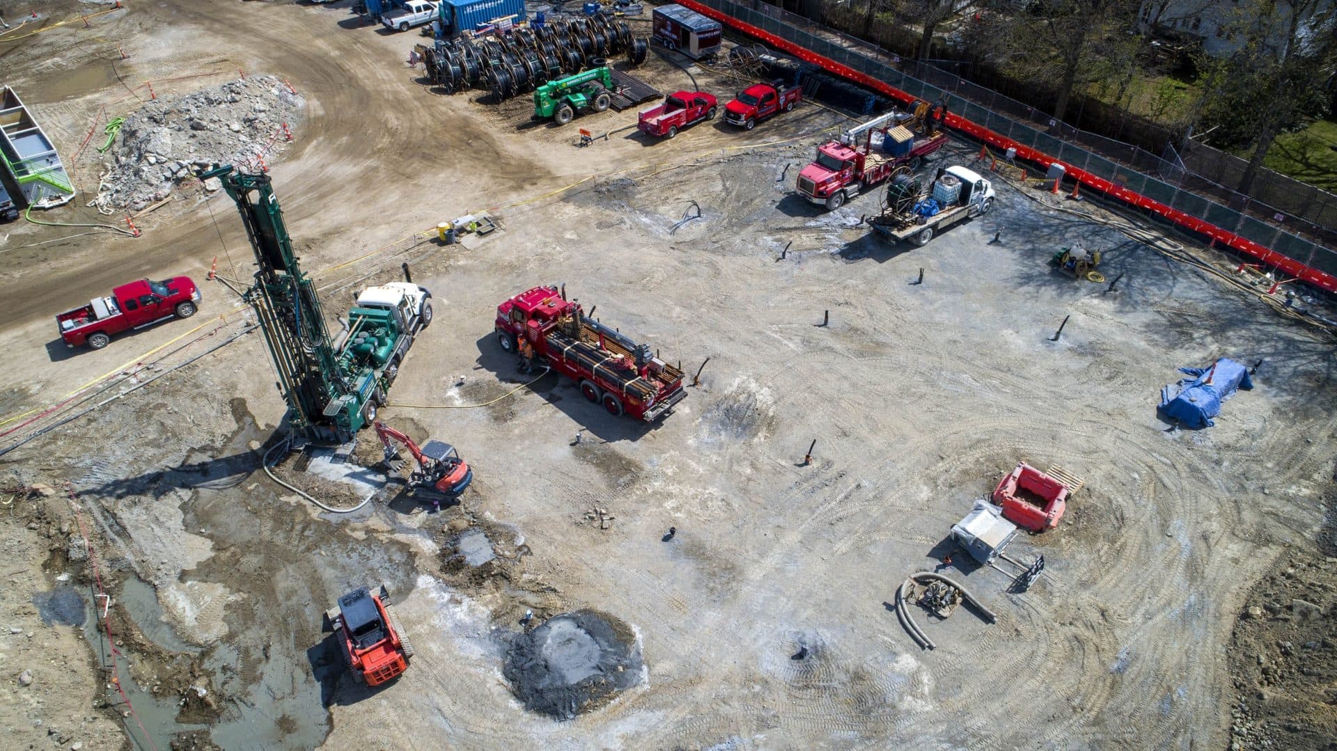 A drilling crew works on a vertical system of geothermal wells on the site of the new Vassal Lane School in Cambridge. (Robin Lubbock/WBUR)