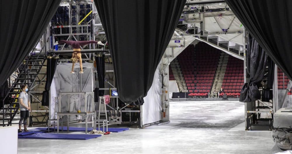 Canes artist Amber van Wijk gets in some practice, as Cirque du Soleil sets up at the Agganis Arena. (Robin Lubbock/WBUR)